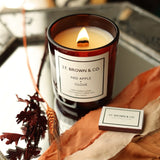 Red Apple + Clove 11oz St. Brown & Co. Candle in Translucent Red Glass